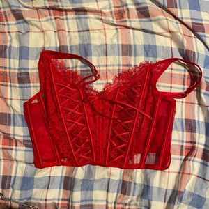 Ruby red satin and lace bustier top by Victoria secret.